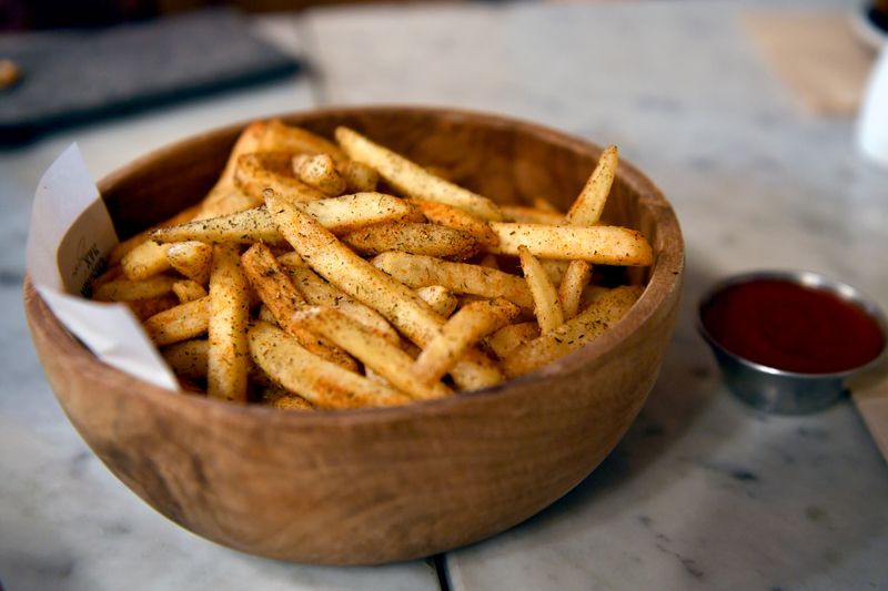 Seasoned Snob Fries golden and crispy